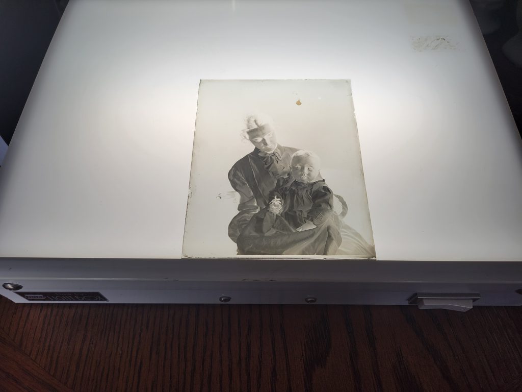 Here you can see a glass negative sitting on the right kind of lightbox. This one courtesy of the now extinct photo lab I used to work for...