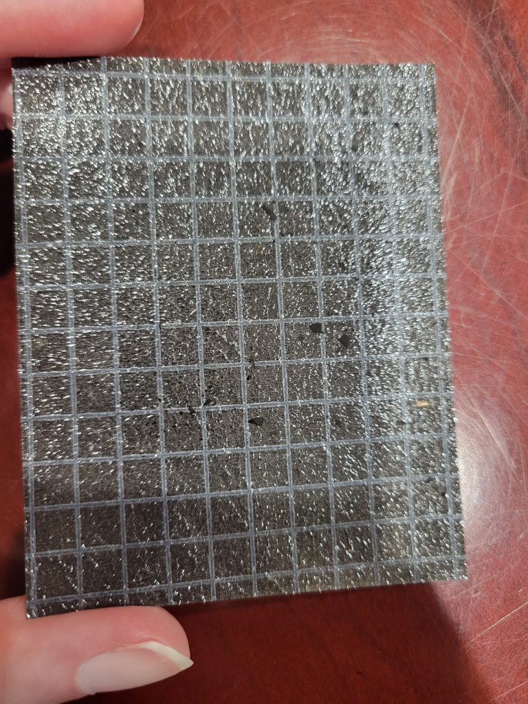 Is sandpaper archival? No, no it is not! In this photo I tried to get a better view of the rough texture of the paper for you all to see. I am still shocked that I found this.