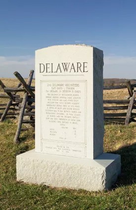 DELAWARE2nd DELAWARE VOLUNTEERS CAPT. DAVID L. STRICKER 3rd BRIGADE, 1st DIVISION, II CORPS This regiment of Richardson's reserve brigade crossed Antietam Creek. Advanced with division and came under heavy artillery fire while holding position immediately beyond crest of the ridge. It moved to right and helped repulse counterattack in gap between French and Richardson's divisions. In final assault on Bloody Lane, the regiment crossed here and took possession of Piper Farm buildings until ordered to retire. LOSSES OFFICERS MEN Killed 12 Wounded 2 Missing 2 Total 58