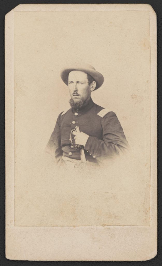 Captain Henry L. Rowell of of Co. C, 89th Illinois Infantry Regiment, in uniform with sword. Photograph shows identified soldier who was wounded at the Battle of Missionary Ridge, Tennessee, on November 25, 1863 and died from his wounds on December 3, 1863.